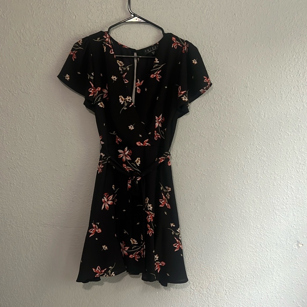 Macy’s black floral pattern dress.